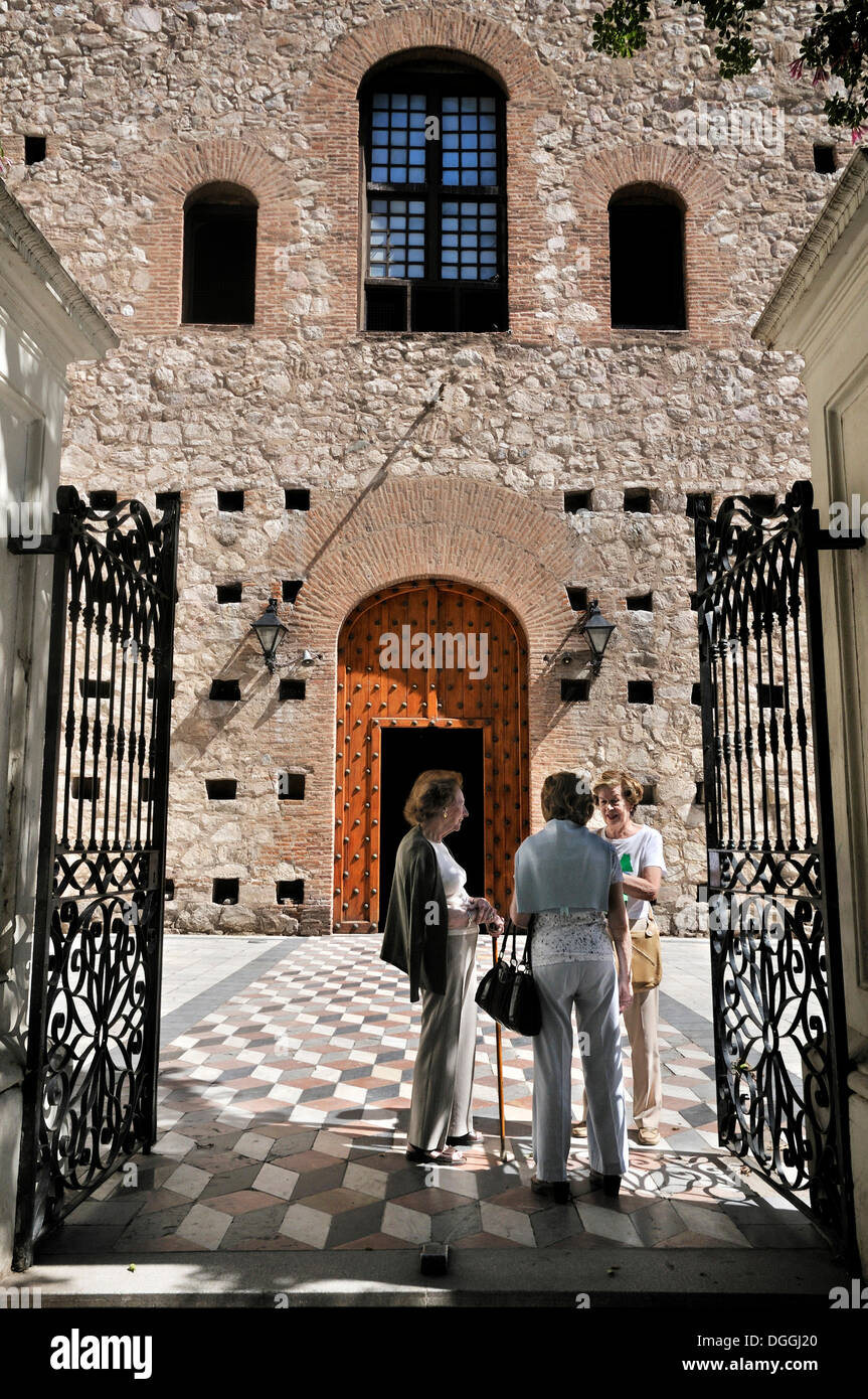 Women talking in front of the main entrance of the Jesuit church of Compania de Jesus, Unesco World Heritage, Cordova, Argentina Stock Photo