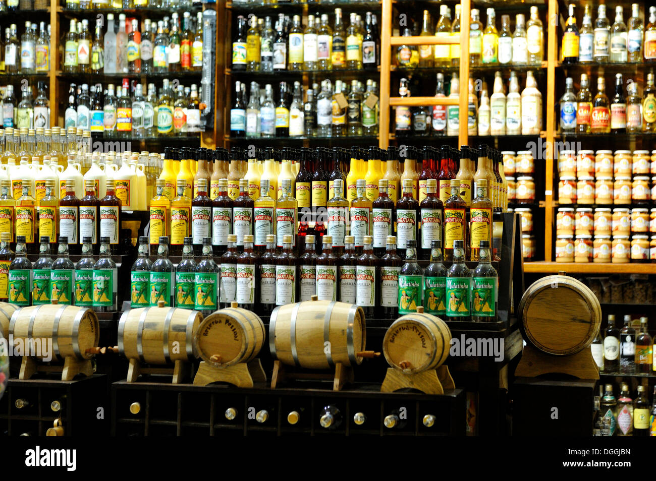 Cachaca, liquor made from fermented sugarcane juice, national drink of Brazil, on sale in a shop in Paraty or Parati Stock Photo