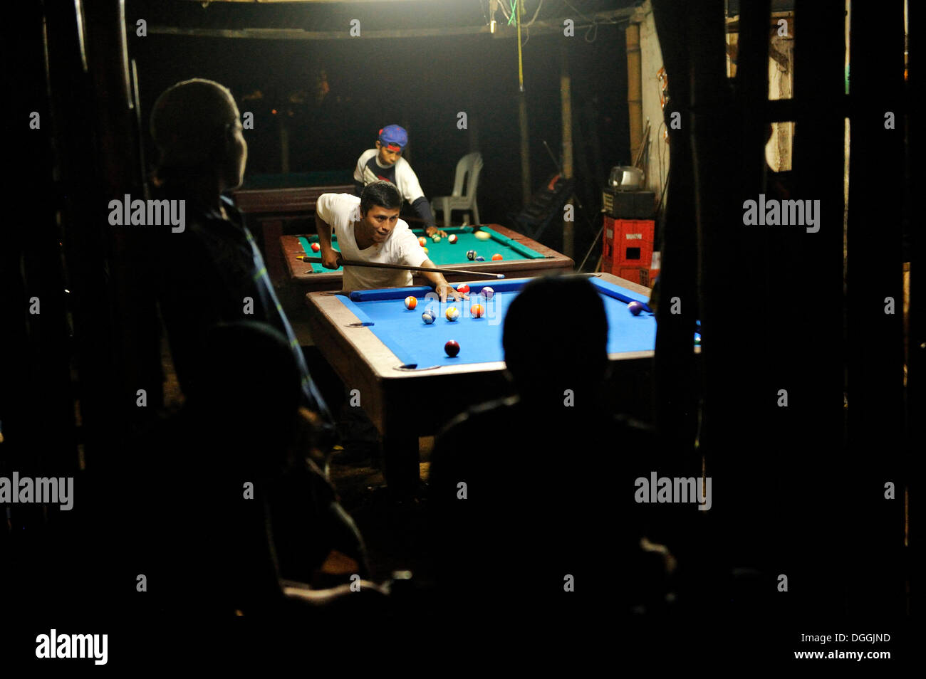 Men playing pool in a bar, Masaya, Nicaragua, Central America Stock Photo