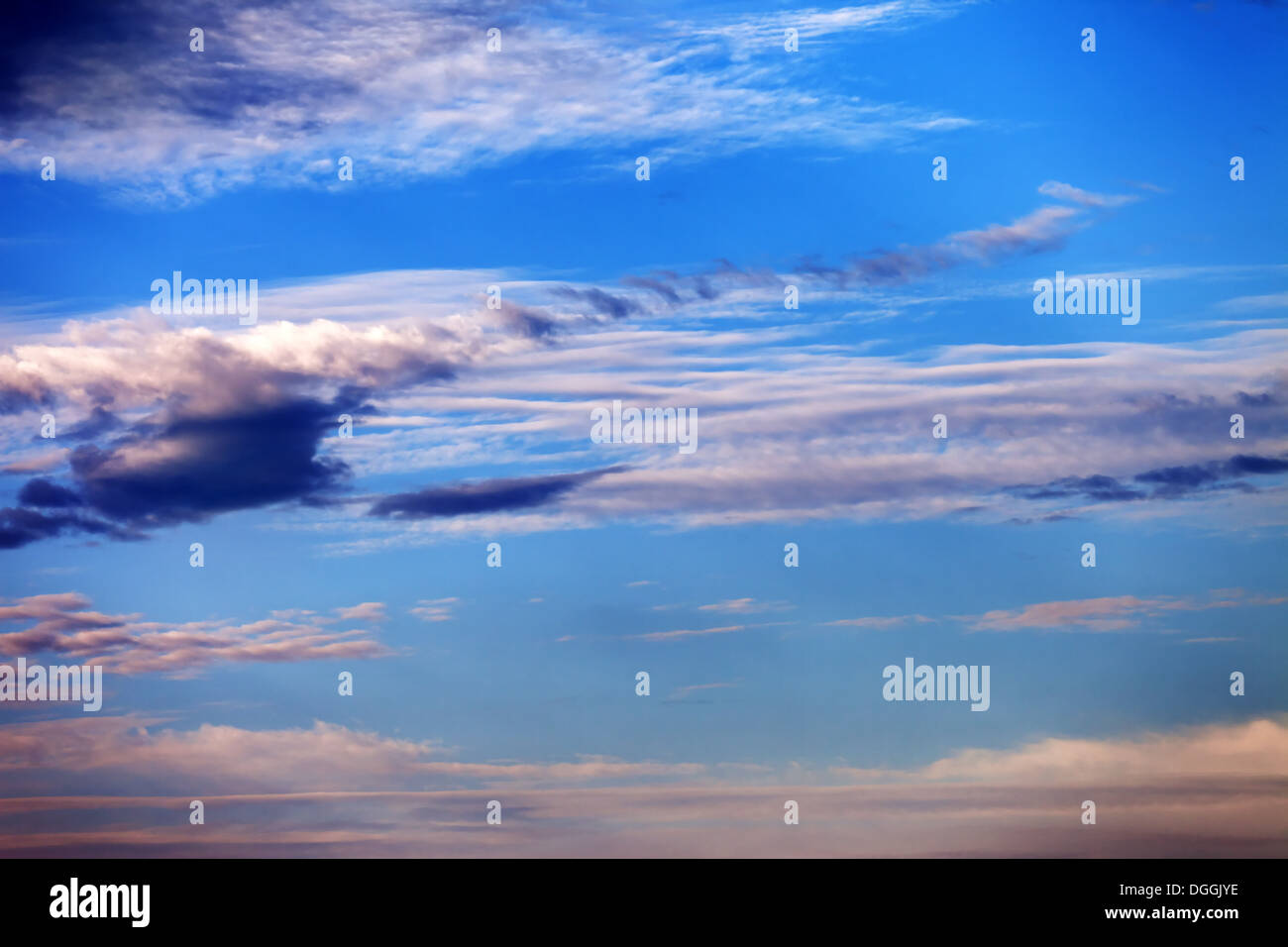 Blue sky sunlit sunset clouds hi-res stock photography and images - Alamy