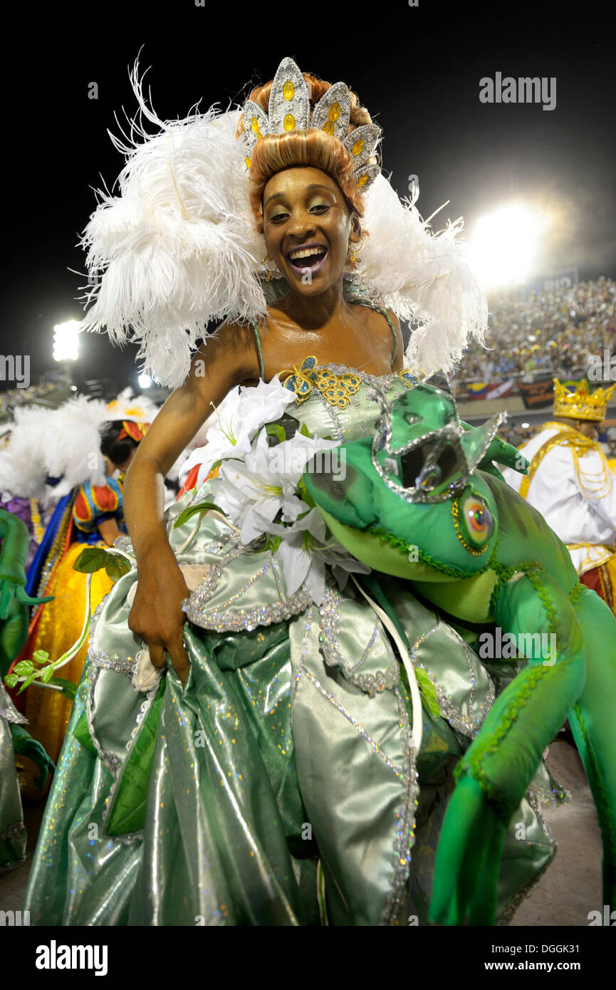 Female dancer dressed in the costume of the princess from the fairy tale 'Frog King' by the Brothers Grimm, parade of the samba Stock Photo