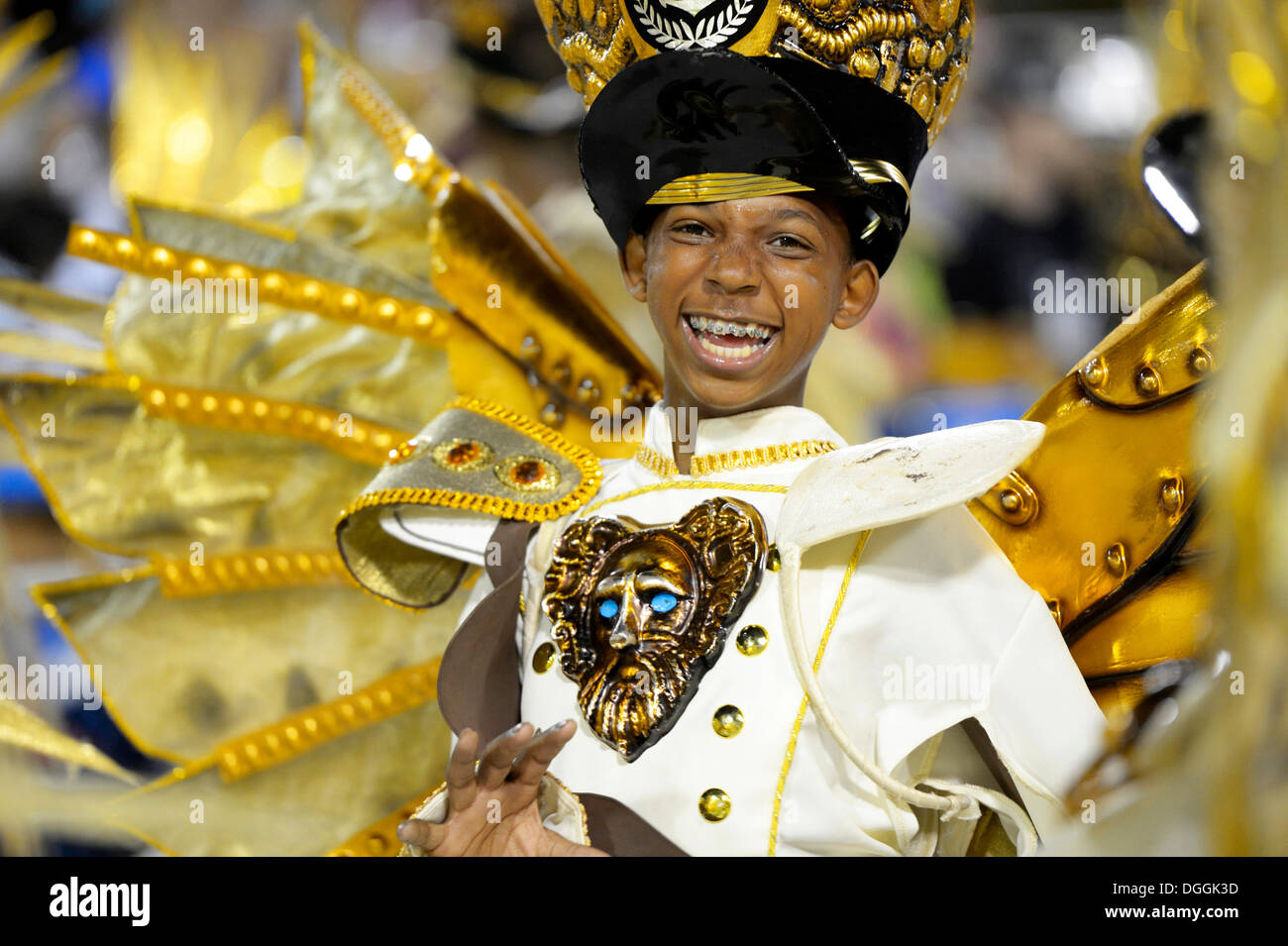 Boy, taking part in the parade of the Academicos do Grande Rio samba school during the Carnival in Rio de Janeiro in 2013 Stock Photo
