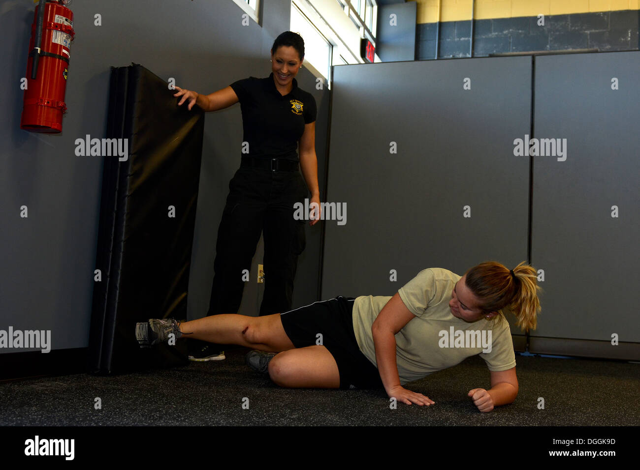 U.S. Air Force Airmen assigned to the 169th Fighter Wing at McEntire Joint National Guard Base, South Carolina Air National Guard, participate in a “females only” self-defense class provided by the Richland County Sherriff’s Department, Oct. 6, 2013. Stock Photo