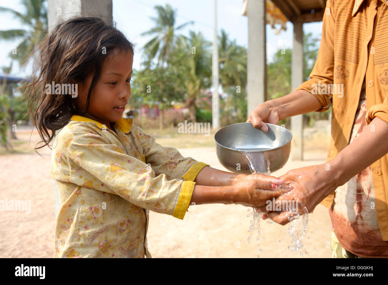 girls cambodia washing Woman washing a girl's hands, hygiene education, Trapang Village, Bathi  District, Takéo Province, Cambodia Stock Photo - Alamy