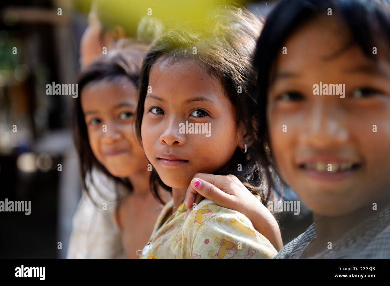 Three girls, portrait, Trapang Village, Bathi District, Takéo Province ...