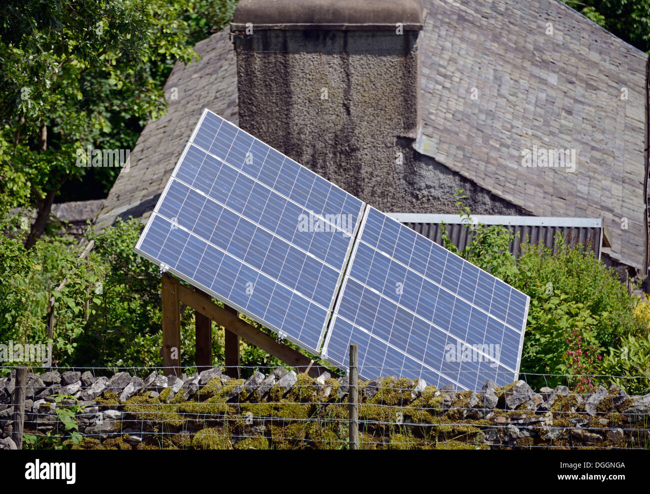 Solar panel installation in garden of house. Serpentine Road, Kendal