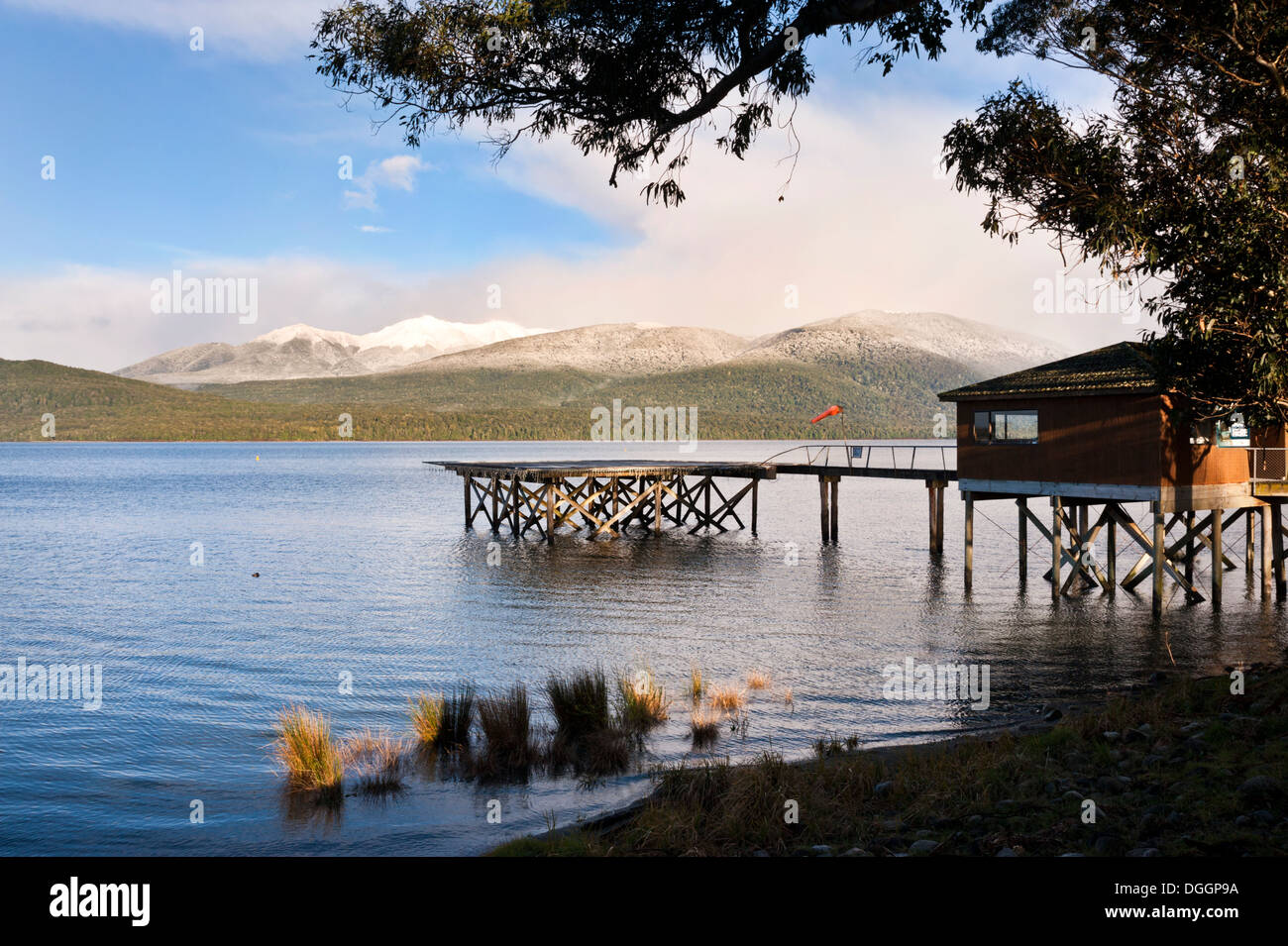 Lake Manapouri at the small town of Te Anau, New Zealand. The town serves as a gateway to Fiordland National Park. Stock Photo