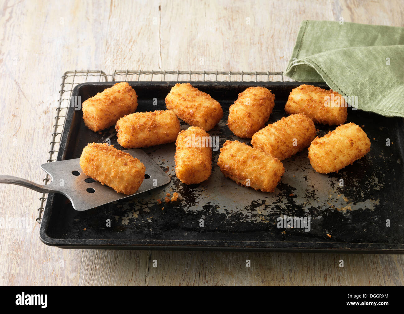 Potato Croquettes on baking tray and wire rack Stock Photo - Alamy
