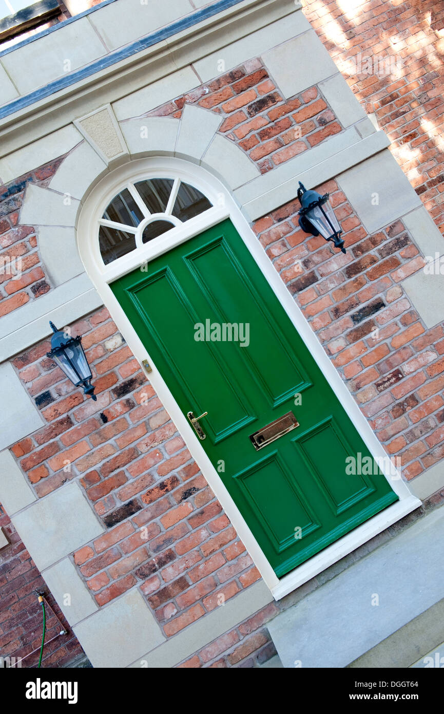 Modern House front door green bold new large Stock Photo - Alamy