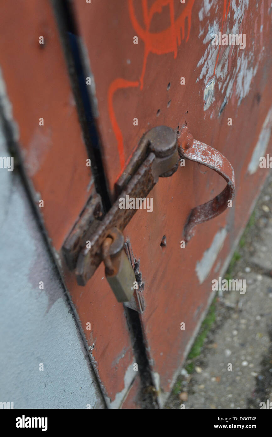 Low down shot of a rusted padlock Stock Photo
