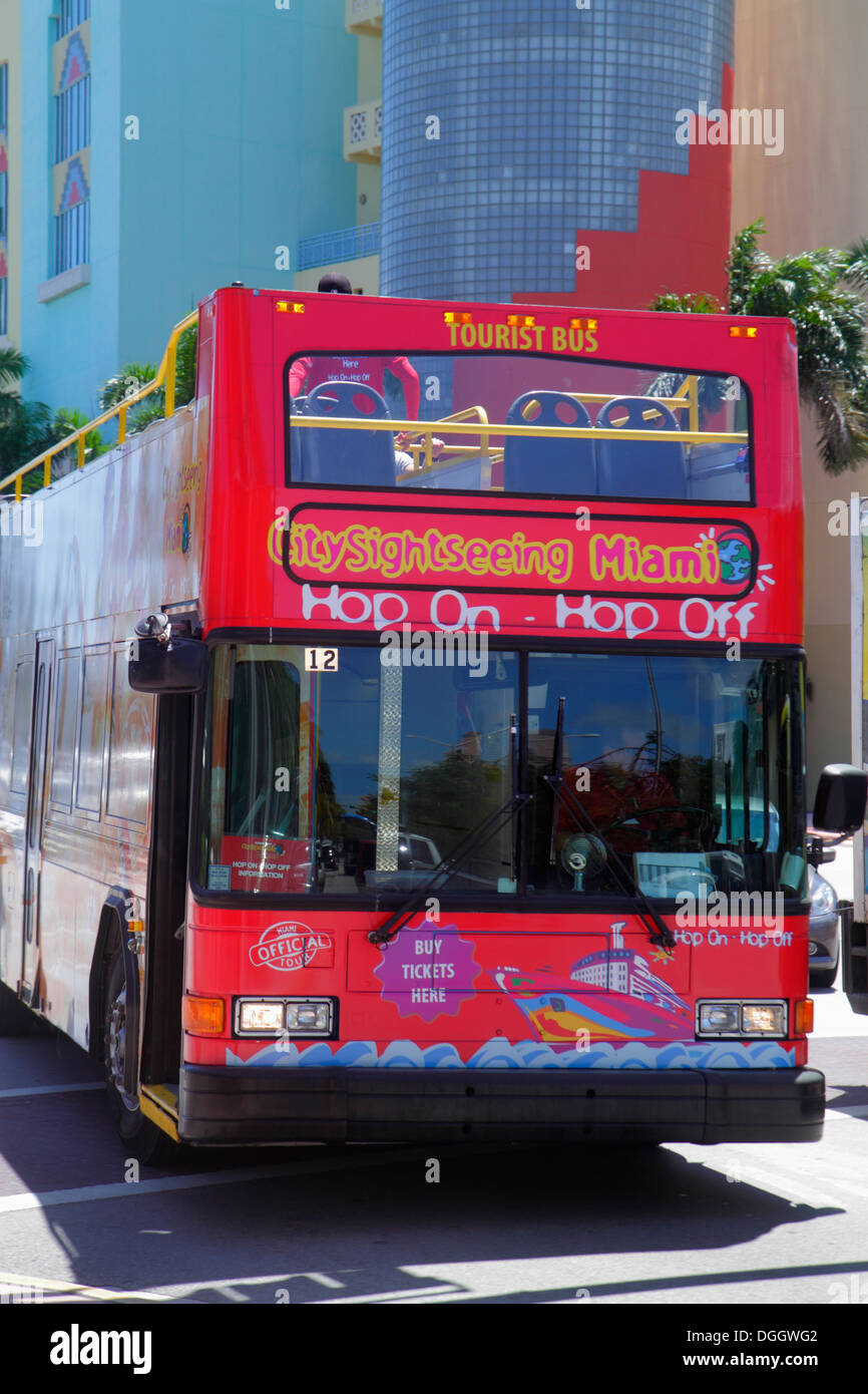 Miami Beach Florida,Washington Avenue,tour bus,coach,double decker,Hop On Hop Off,City,red,looking FL130813004 Stock Photo
