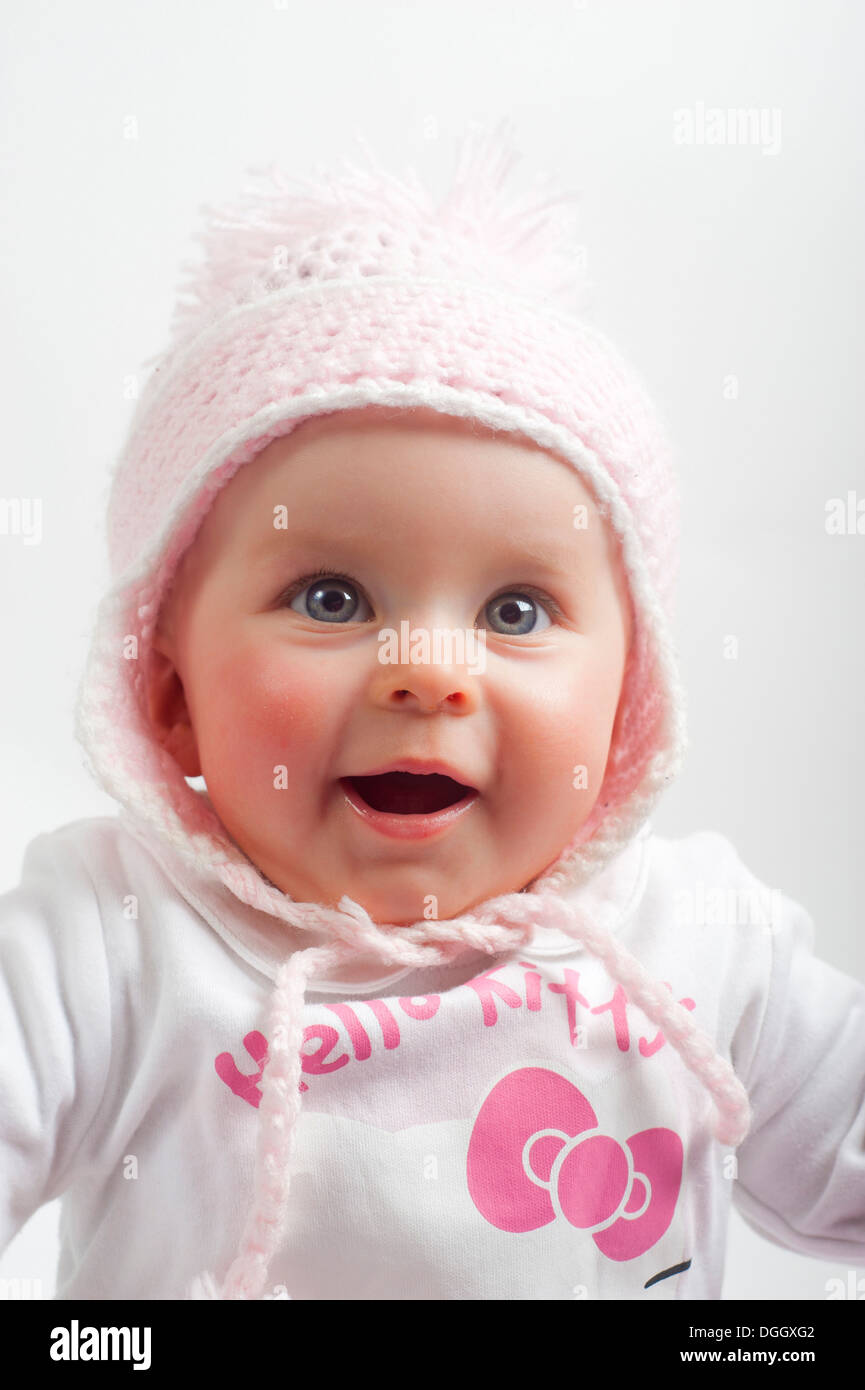 Baby wearing woolly hat Stock Photo Alamy