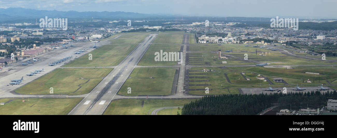 Aircraft fill the taxiway at Yokota Air Base, Japan, Oct.7, 2013. 18 aircraft from Kadena Air Base and Marine Corps Air Station Stock Photo