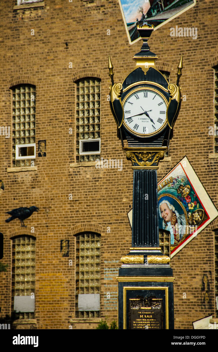 Soldiers and Sailors Memorial Clock and town mural in Memorial Park in DeKalb, Illinois, a town along the Lincoln Highway. Stock Photo