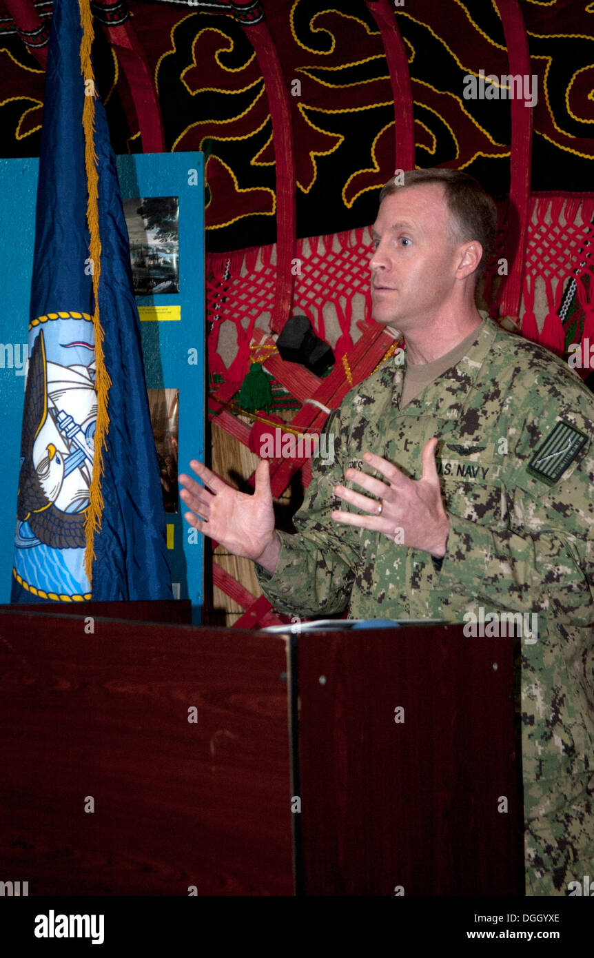 Lt.Cmdr. Thomas Fries, operations officer for U.S. Navy Forces Central Command, speaks on Naval history during a Navy birthday celebration at Transit Center at Manas, Kyrgyzstan, Oct. 13, 2013. Although Kyrgyzstan is further from a body of water than any Stock Photo