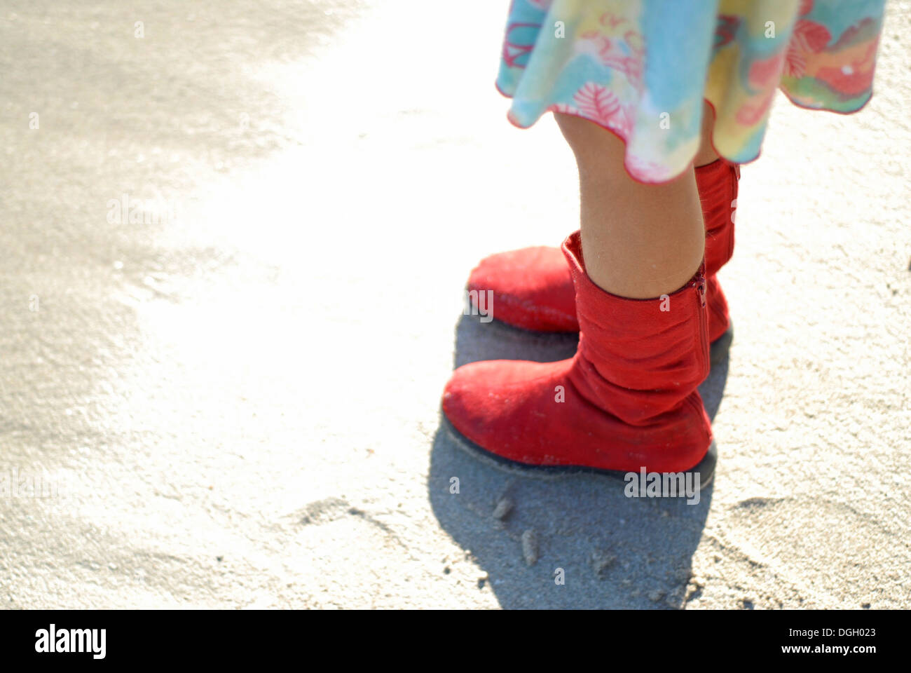 Cute brazilian seven year old girl with red boots, playing on the Stock  Photo - Alamy