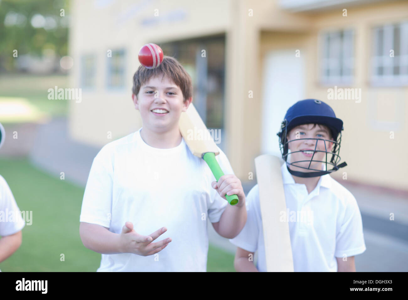 Boy catching cricket ball Stock Photo Alamy