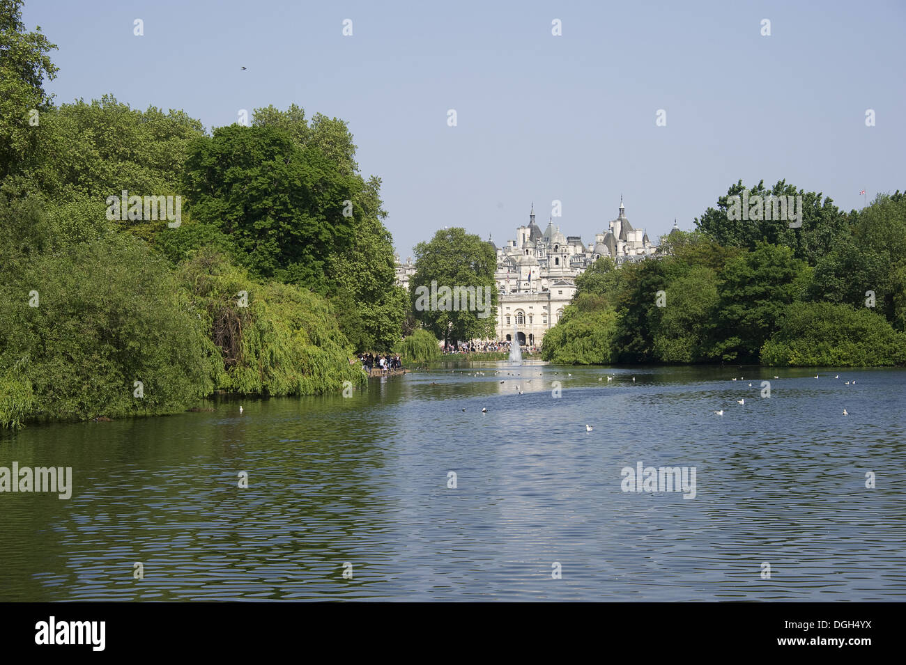 View across lake in urban parkland towards Horse Guards St. James's Park Lake St. James's Park City of Westminster London Stock Photo
