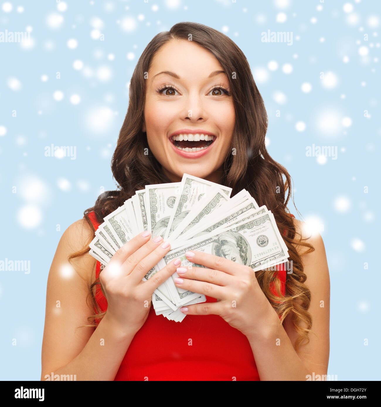 woman in red dress with us dollar money Stock Photo