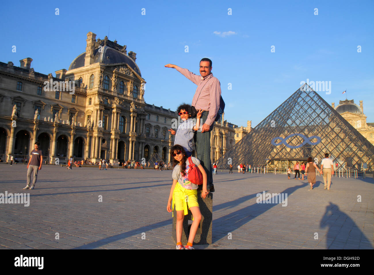 Paris France,1st arrondissement,Napoleon Courtyard,Louvre Art Museum,Musee du Louvre Palace,Pyramid,Muslim ethnic man men male,father,boy boys male ki Stock Photo