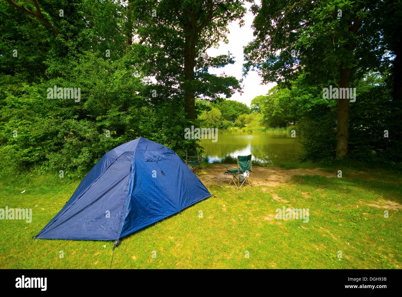 A tent by a fishing lake Stock Photo