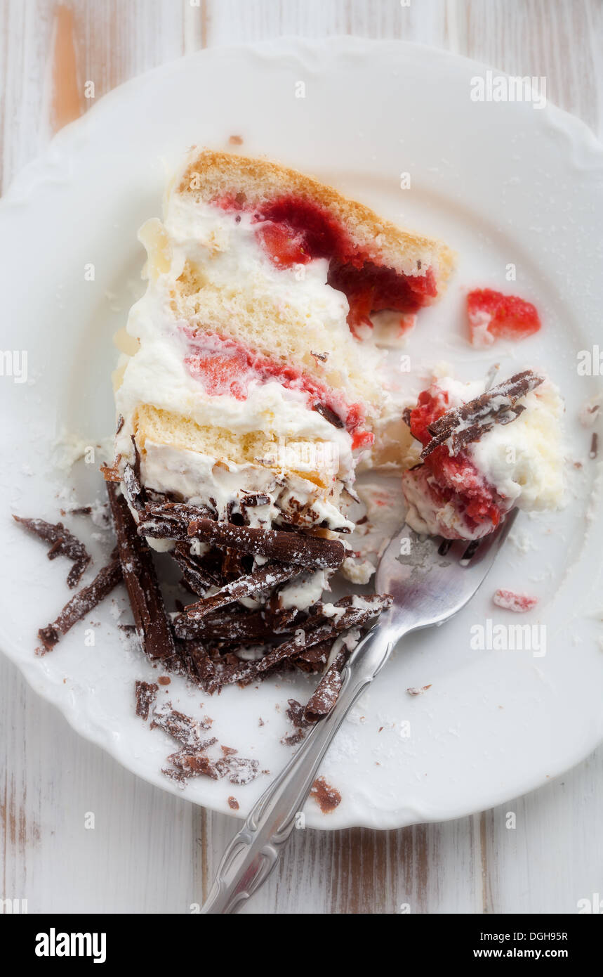 Strawberry stracciatella cake with chocolate curls on top Stock Photo