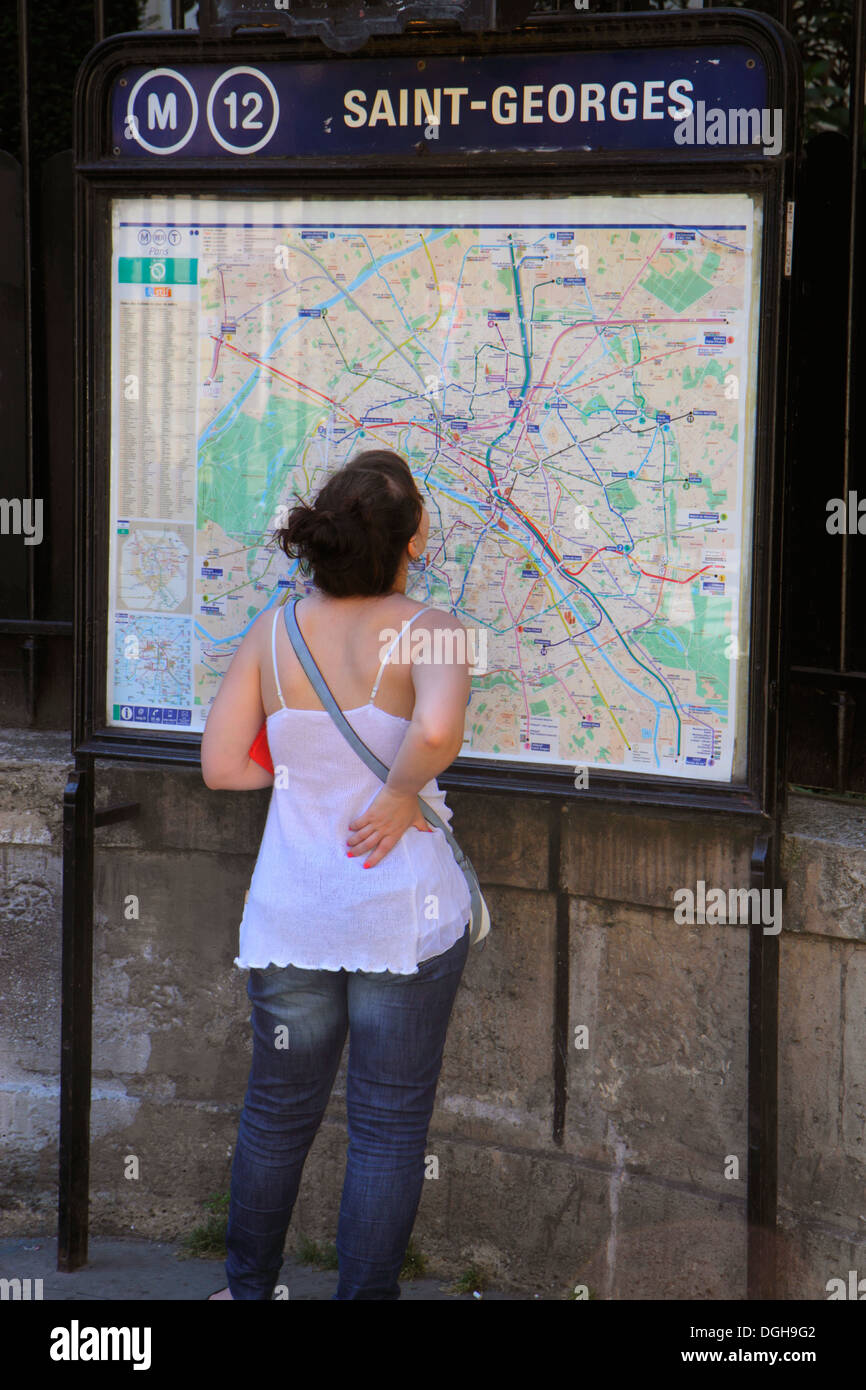 Paris France,9th arrondissement,Place Saint St. Georges,map,Metro,adult,adults,woman female women,looking at,France130816003 Stock Photo