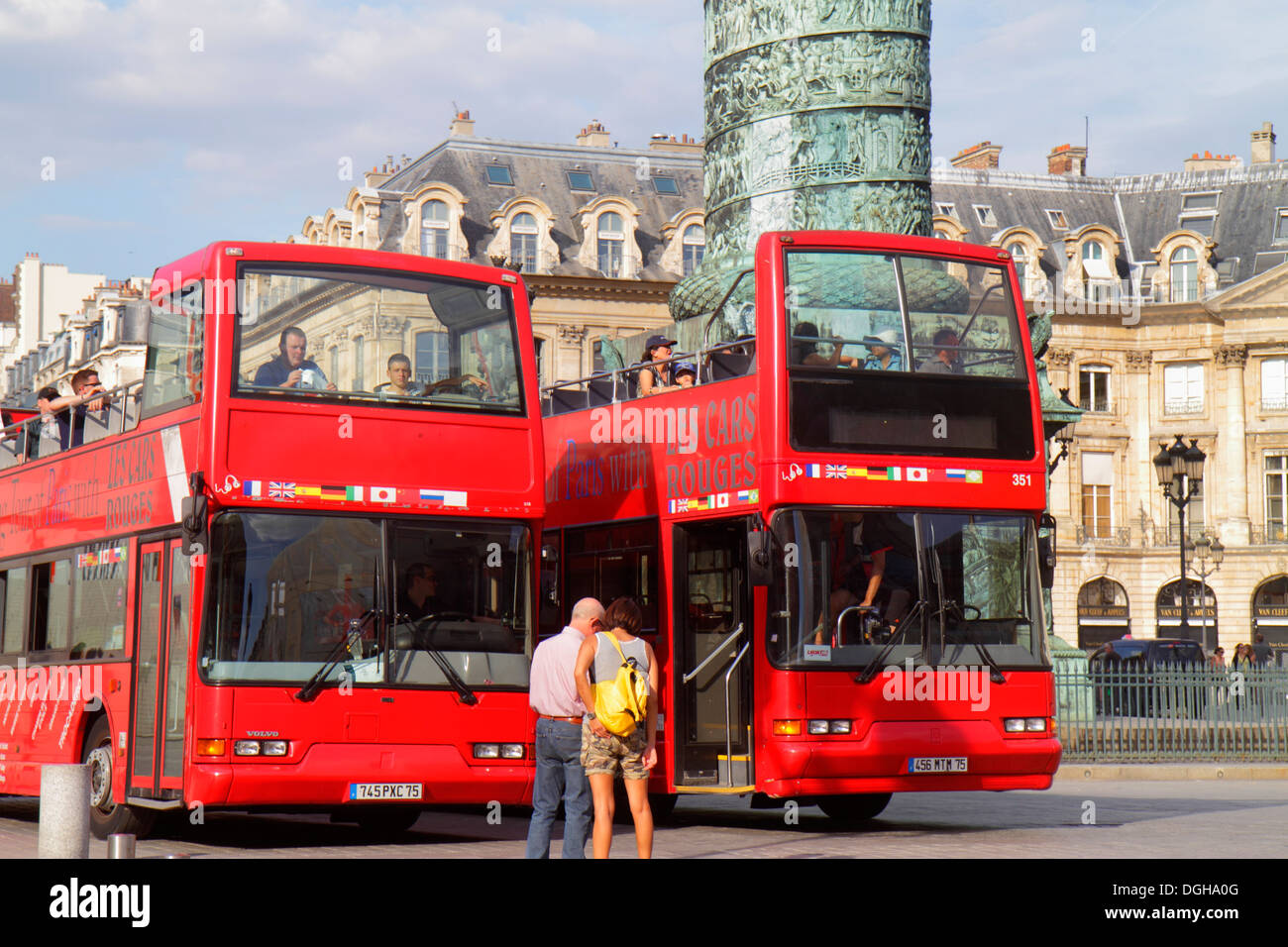 Paris France,1st arrondissement,Place Vendôme,double decker bus,coach,Les Cars Rouges,billboard ad,advertising,historic Haussmann building,column,memo Stock Photo