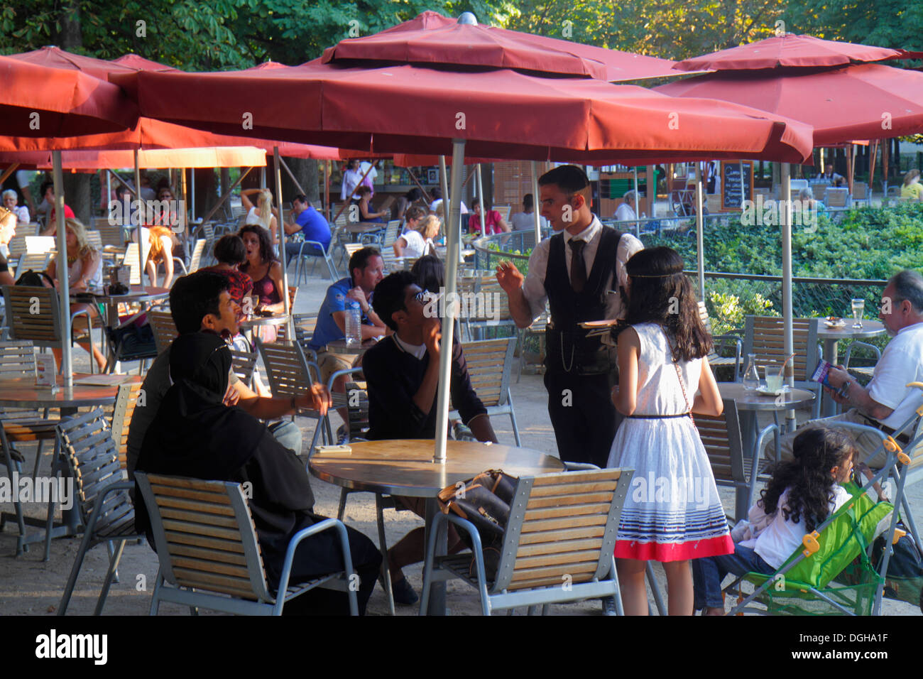 Paris France,8th arrondissement,Tuileries Garden,Jardin des Tuileries,park,trees,chairs,tables,umbrellas,restaurant restaurants food dining cafe cafes Stock Photo