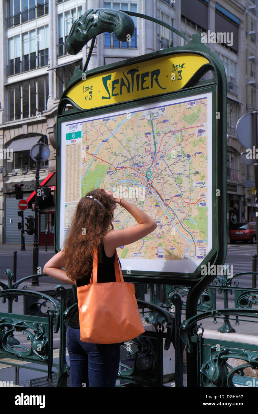 Paris France,2nd arrondissement,Rue des Petits Carreaux,Station Sentier Line 3,Metro,subway,train,map,information,adult,adults,woman female women,look Stock Photo