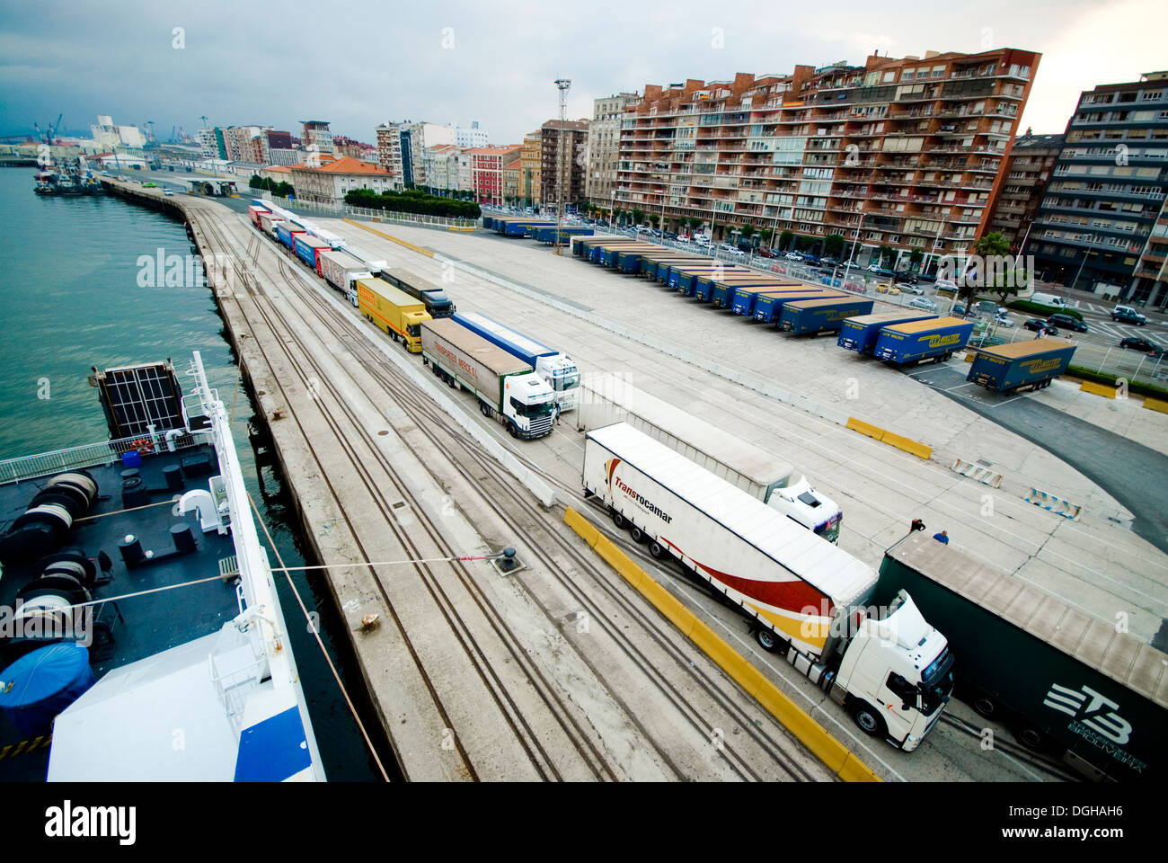 Lorries queue for a ferry at the port of Bilbao in Spain Stock Photo