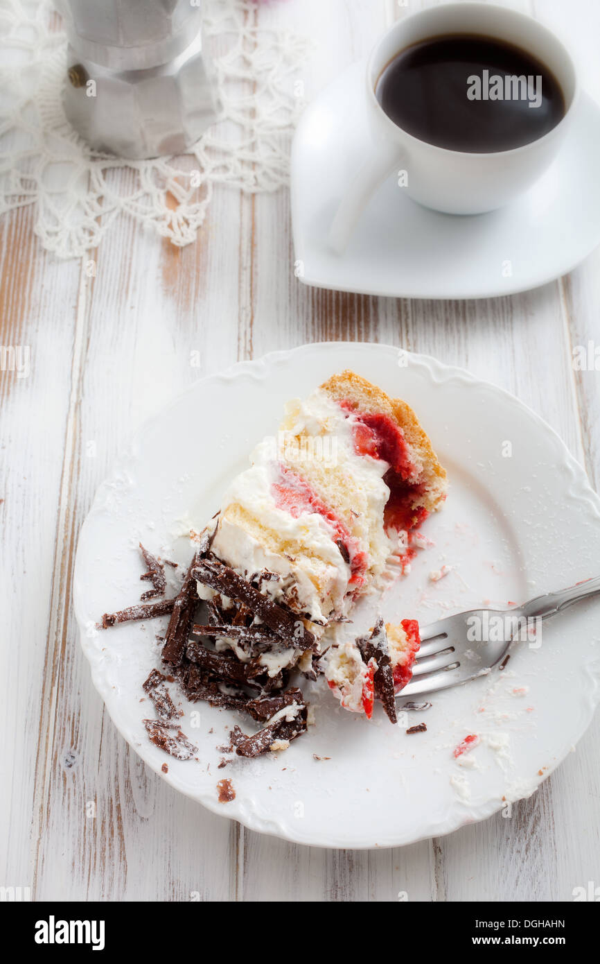 Strawberry stracciatella cake with chocolate curls on top Stock Photo