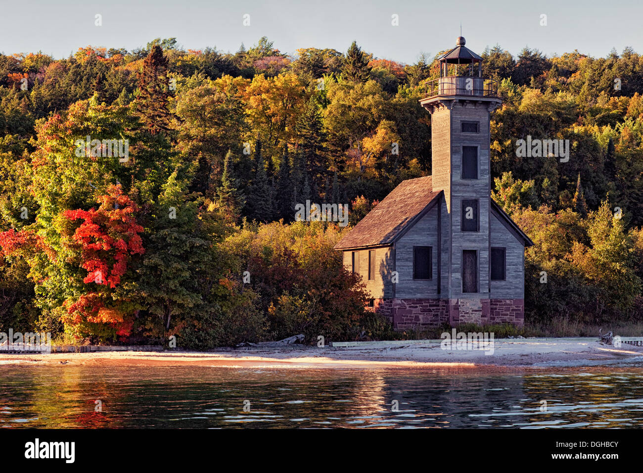 Warmth of autumn's evening light on Grand Island East Channel Lighthouse along Lake Superior in Michigan's Upper Peninsula. Stock Photo