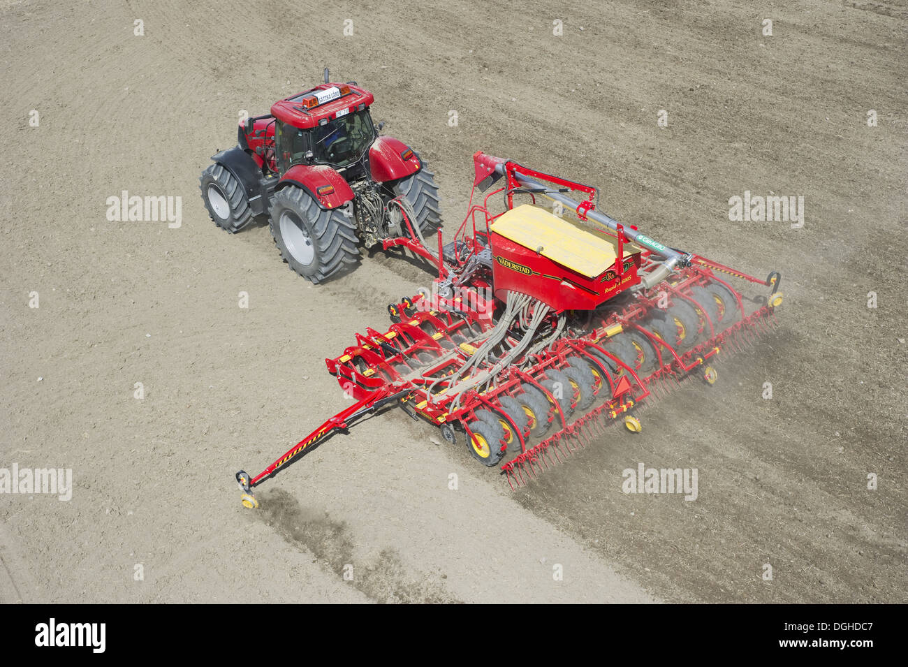 Case 225 CVX tractor with Vaderstad Rapid A 600S seed drill, drilling arable field, Upplands Vasby, Sweden, may Stock Photo