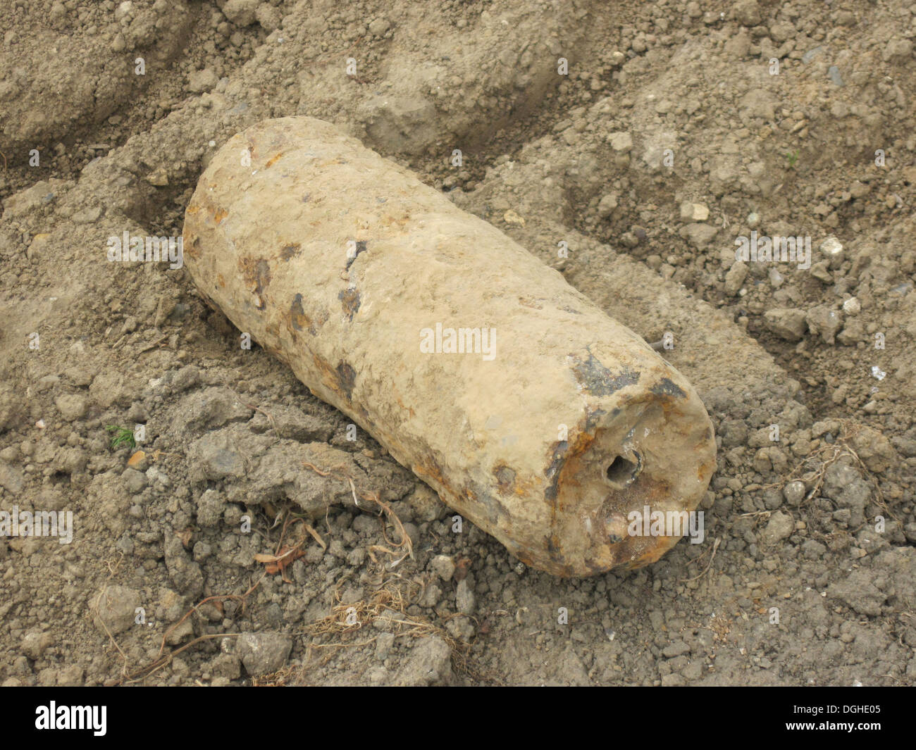 Iron Harvest' World War One shrapnel shell unexploded with shrapnel balls still inside Somme Battlefield Somme Picardy France Stock Photo