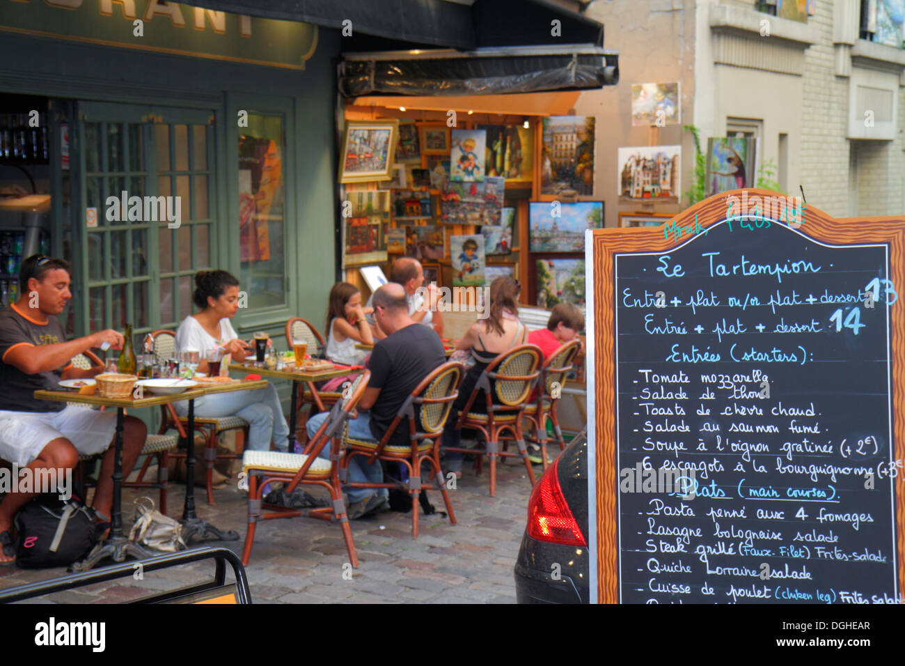 Paris France,Europe,French,18th arrondissement,Montmatre,Place du Tertre,restaurant restaurants food dining eating out cafe cafes bistro,cuisine,food, Stock Photo