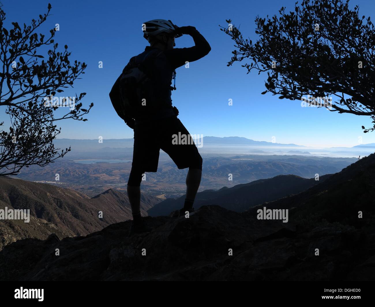 Modjeska Peak, California, USA. 20th Oct, 2013. Mountain biker BRIAN EPHRAIM takes in the
