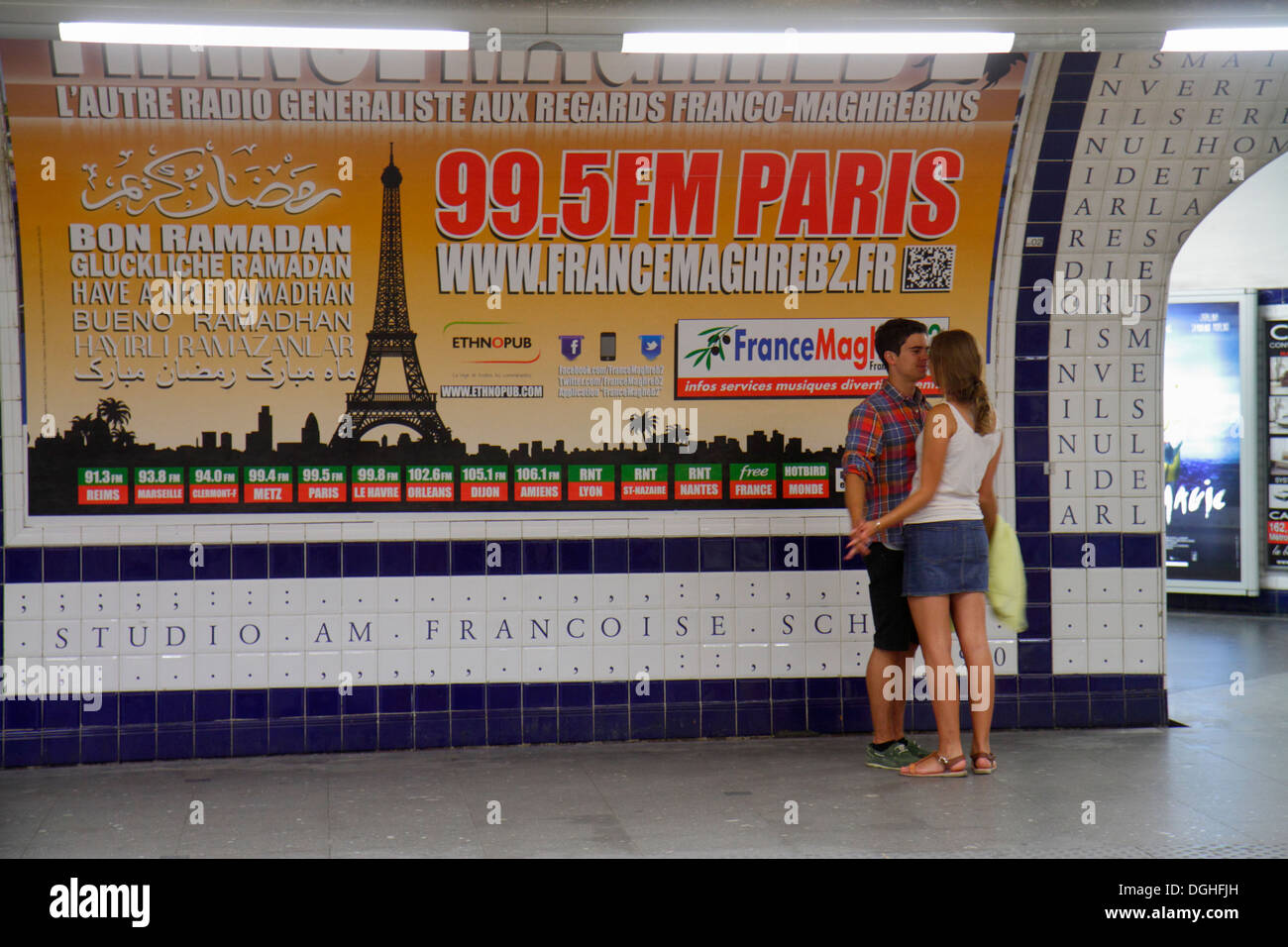 Paris France,Europe,French,1st arrondissement,Concorde Metro Station Line 1 8 12,subway,train,public transportation,platform,riders,billboard advertis Stock Photo