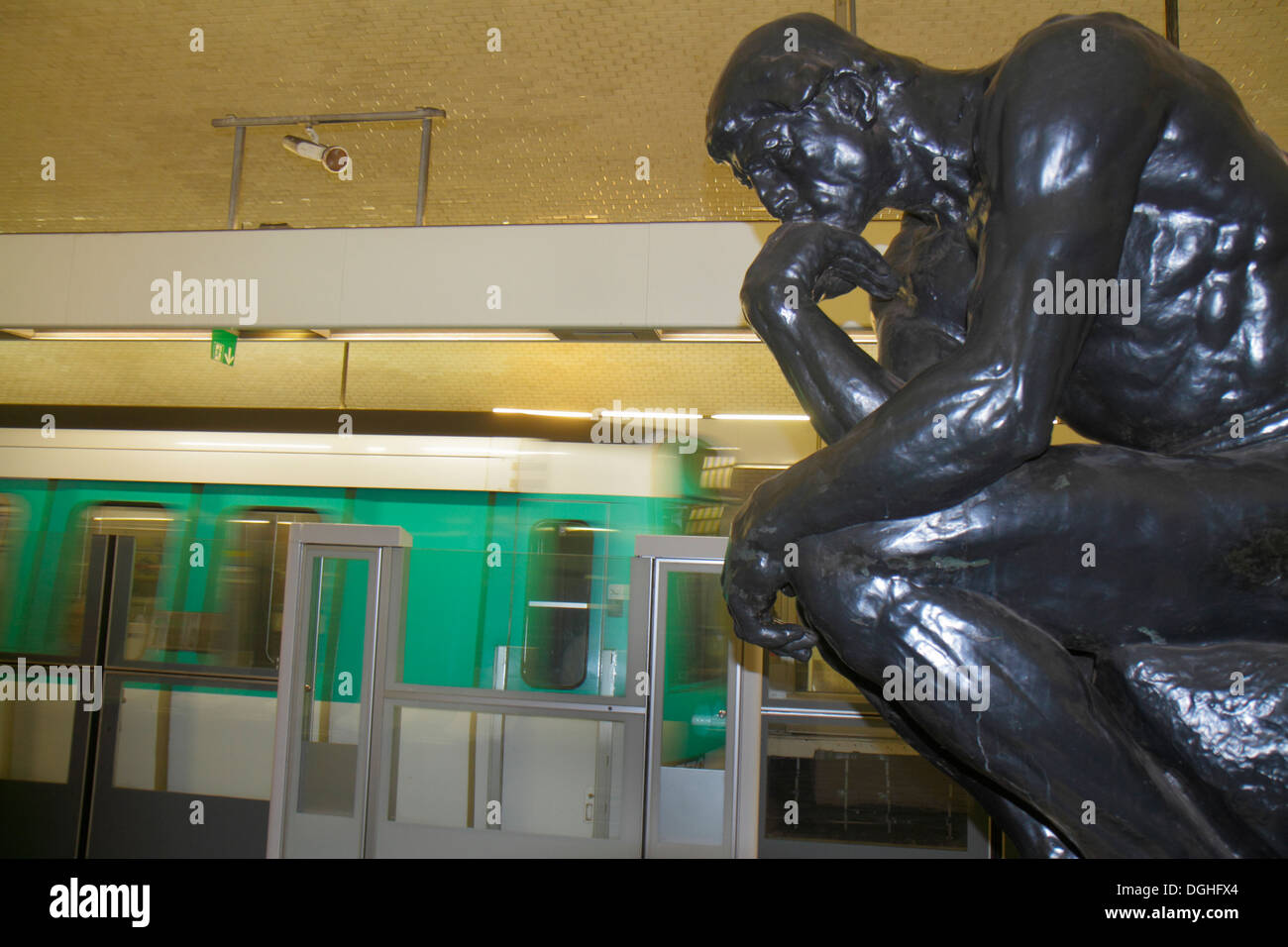 Paris France,7th arrondissement,Varenne Metro Station Line 13,subway,train,platform,Rodin,The Thinker,train,art,sculpture,France130818043 Stock Photo