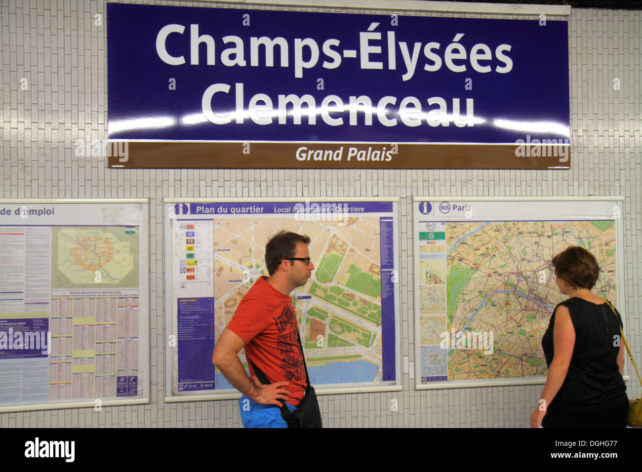 Paris France,Europe,French,8th arrondissement,Champs Elysees Clemenceau Metro Station Line 1 13,subway,train,public transportation,sign,logo,map,adult Stock Photo