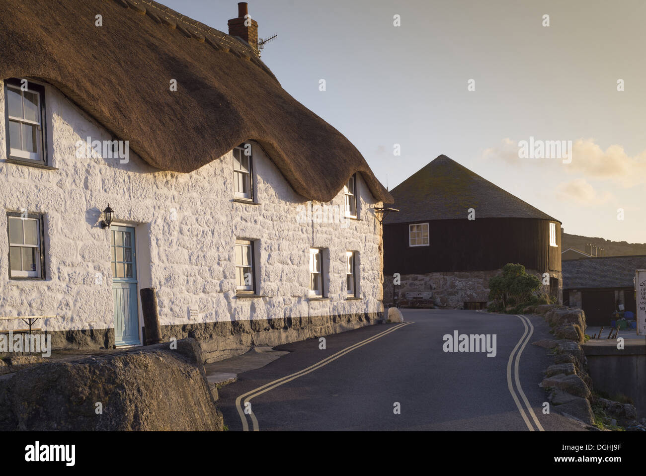 Old fisherman's cottage and The Roundhouse (old capstan house) in