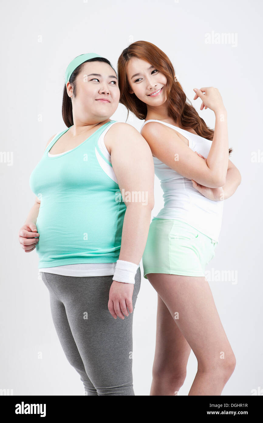 Fat girl thin girl posing hi-res stock photography and images - Alamy