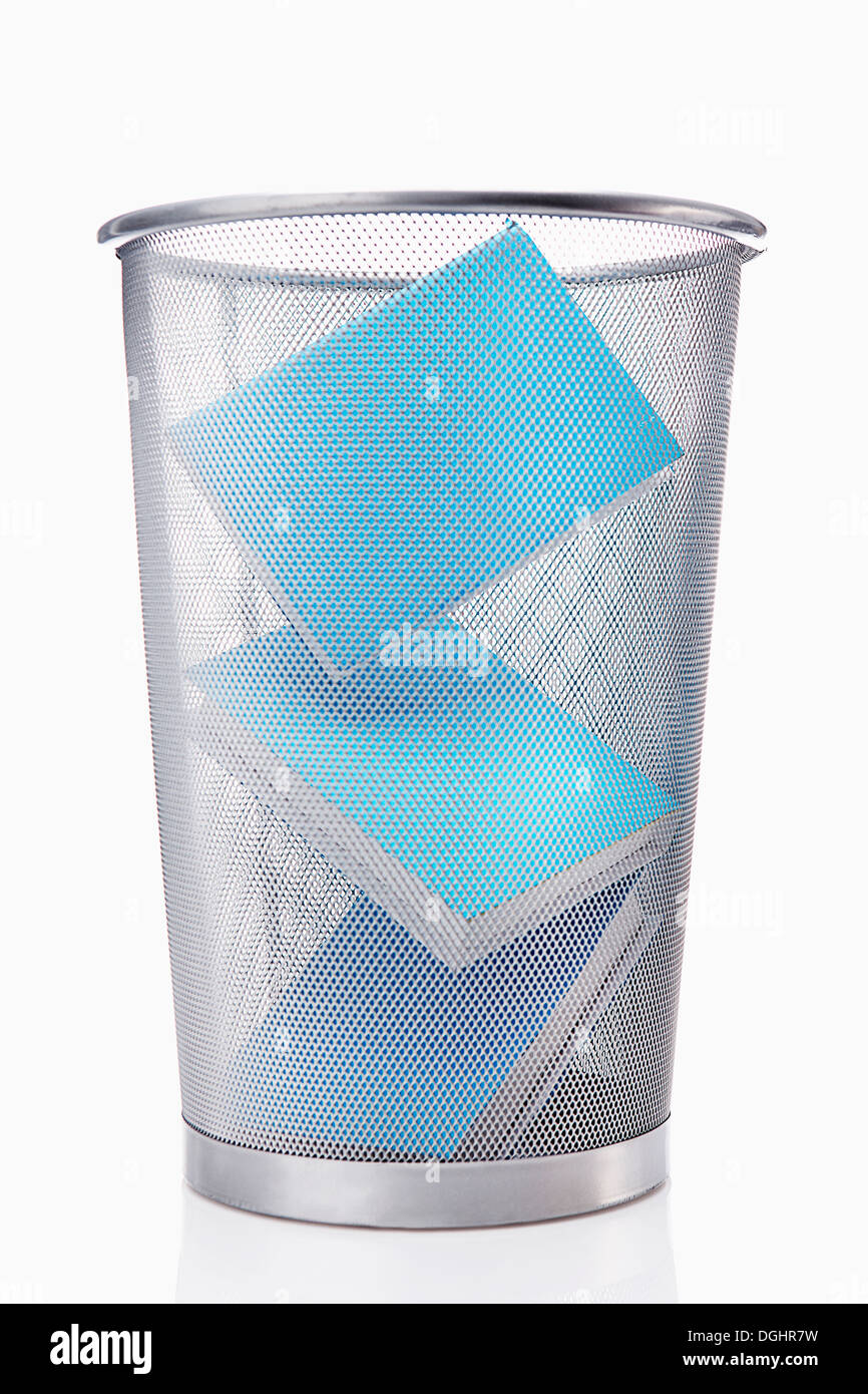 three books in a trash bin Stock Photo - Alamy