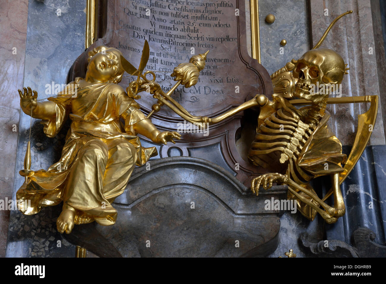 The Grim Reaper, a golden skeleton in the foyer of Asamkirche church, Munich, Bavaria Stock Photo