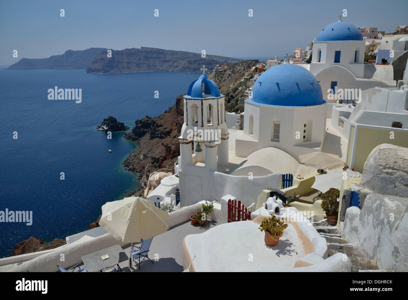 View from the rim across the rooftops or Oía into the Caldera, Oía, Santorini, Cyclades, Greek Islands, Greece, Europe Stock Photo