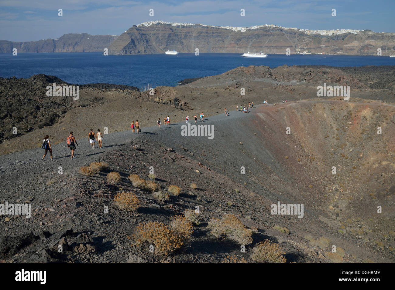 Cruise tourists on the volcanic island Nea Kameni in the caldera, Santorin, Cyclades, Greece Stock Photo