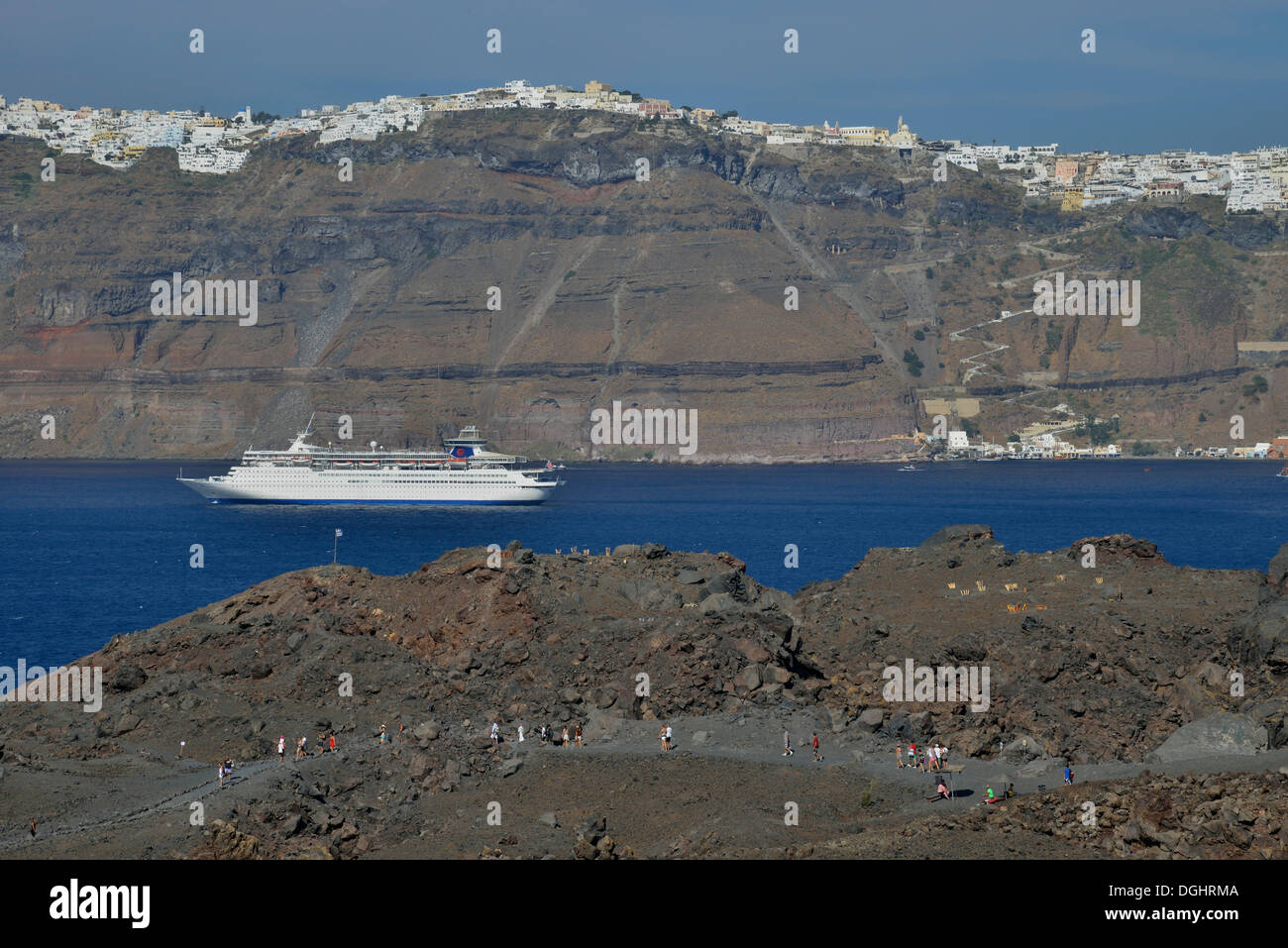 Cruise tourists on the volcanic island Nea Kameni in the caldera, Santorin, Cyclades, Greece Stock Photo