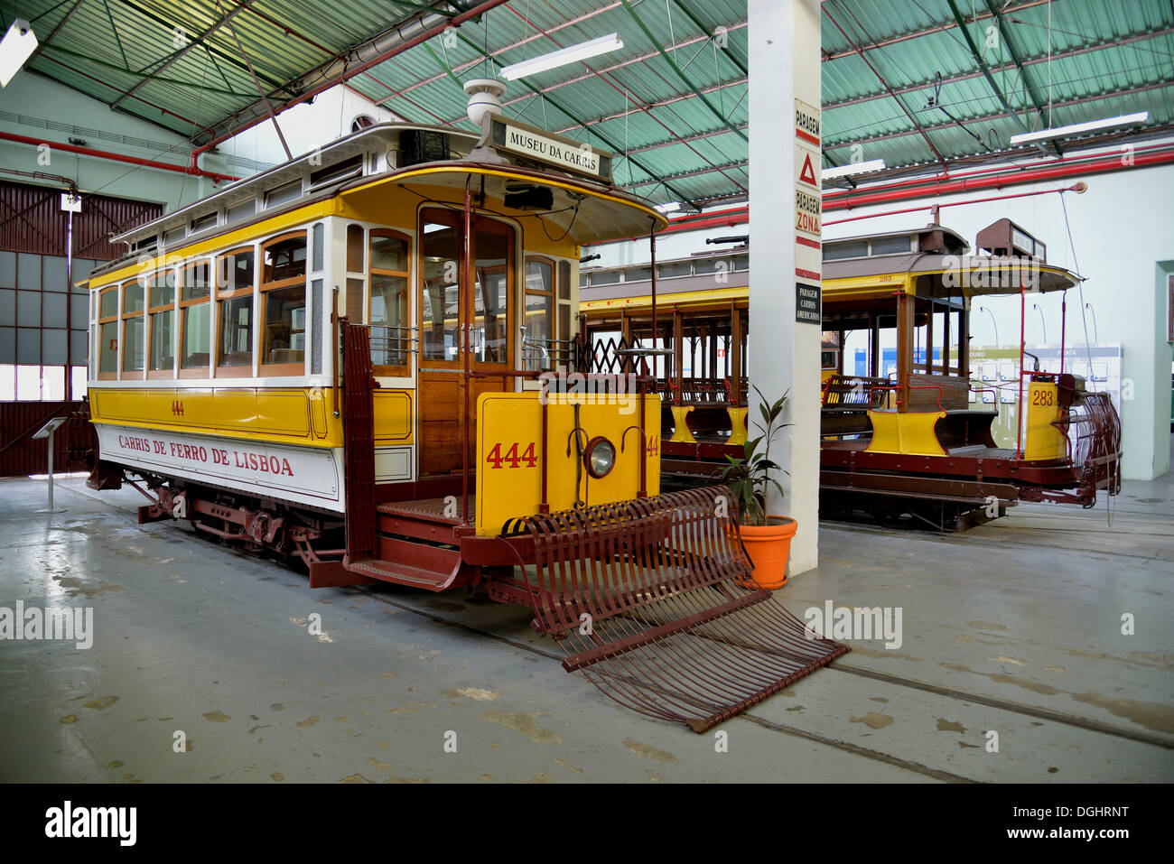 Old trams in the Museu da Carris tram museum, Lisbon, Portugal Stock Photo