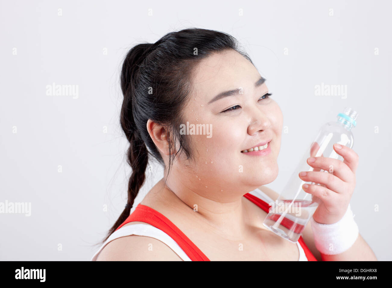 a fat girl in a gym outfit posing after work out Stock Photo Alamy