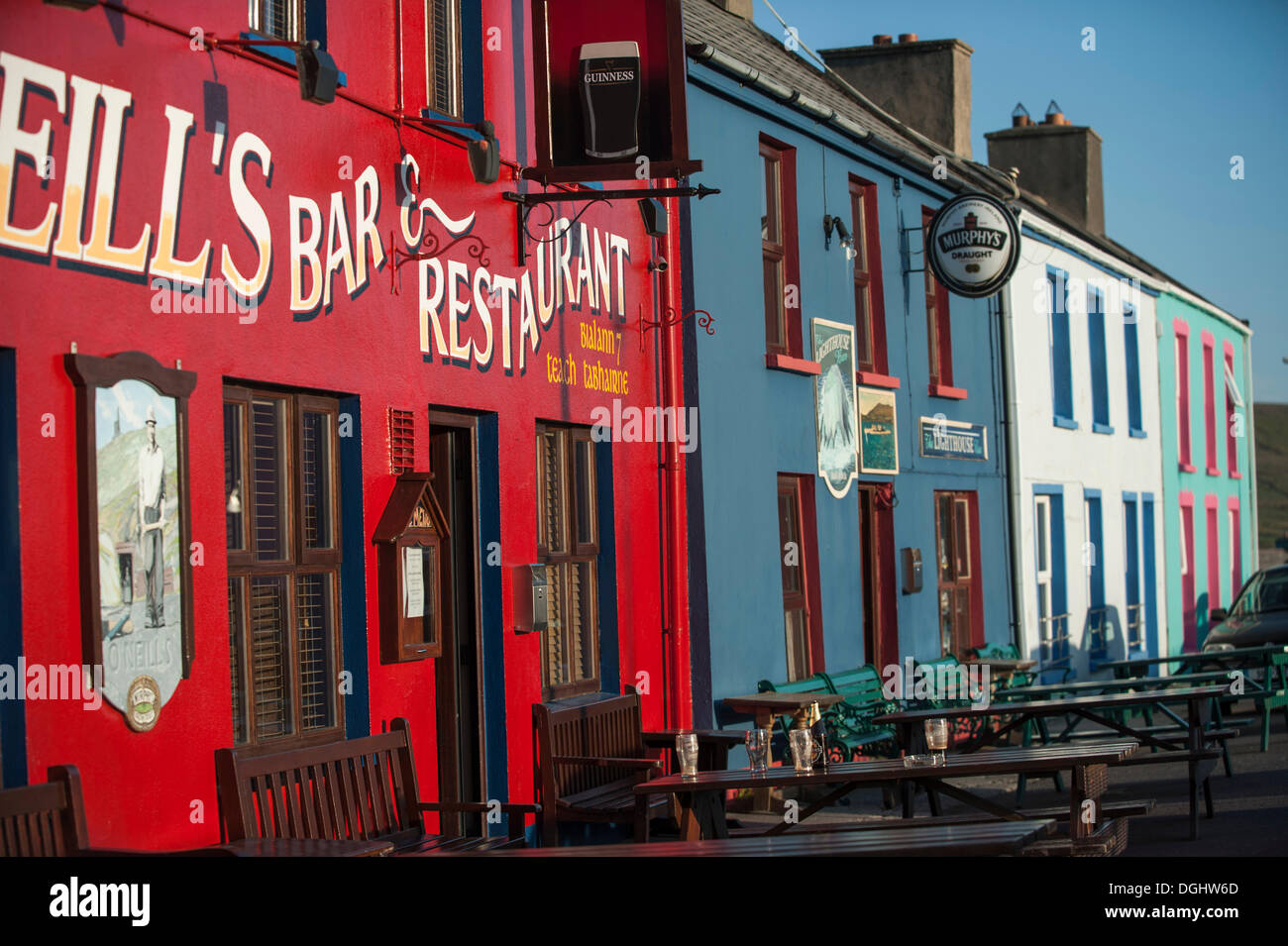 Colorful row of houses with O'Neill's Restaurant, Allihies, Ring of Beara, Ireland, Europe Stock Photo